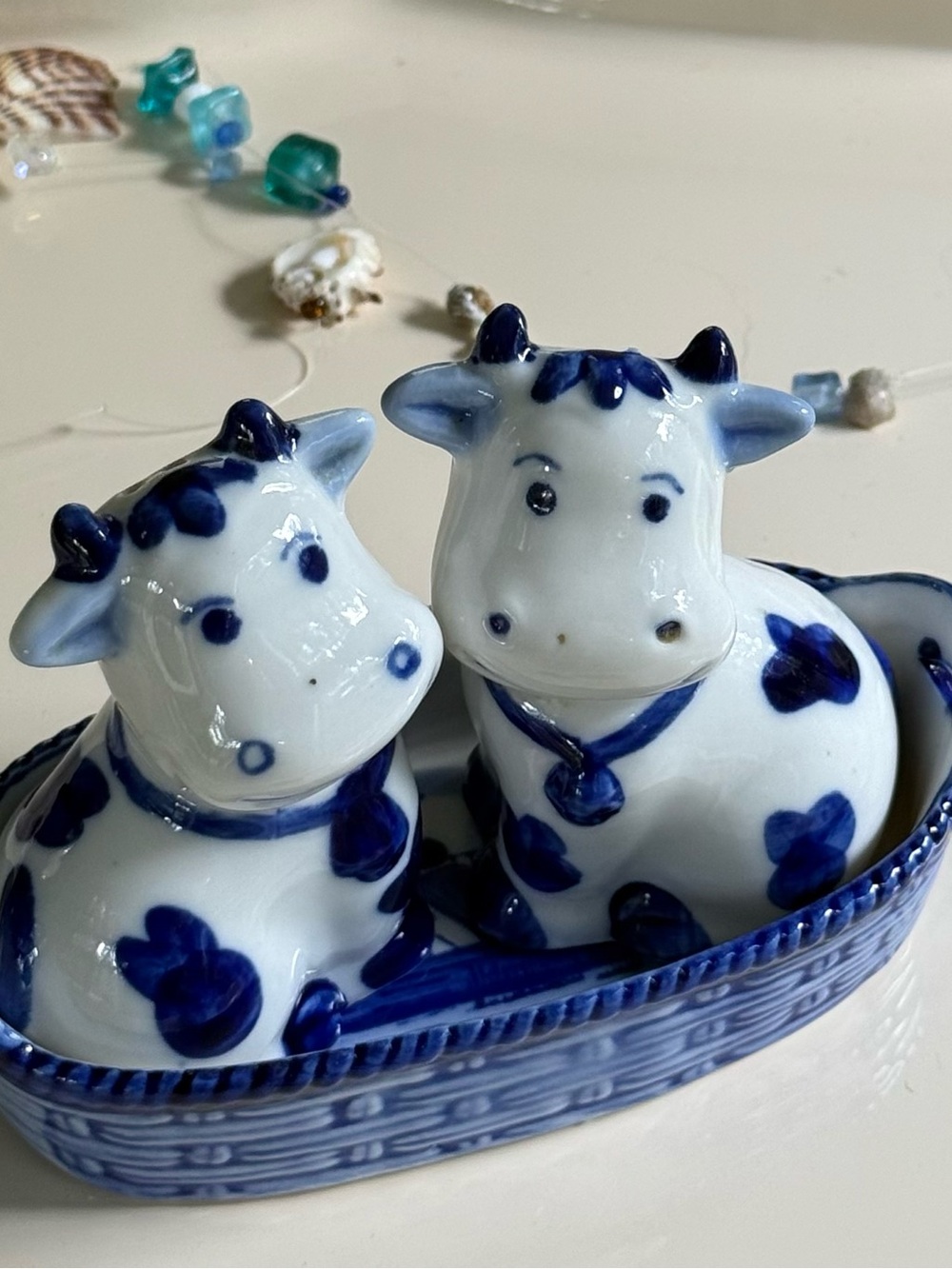 Vintage Delft Blue and White Ceramic Cow Salt and Pepper Shakers in Basket